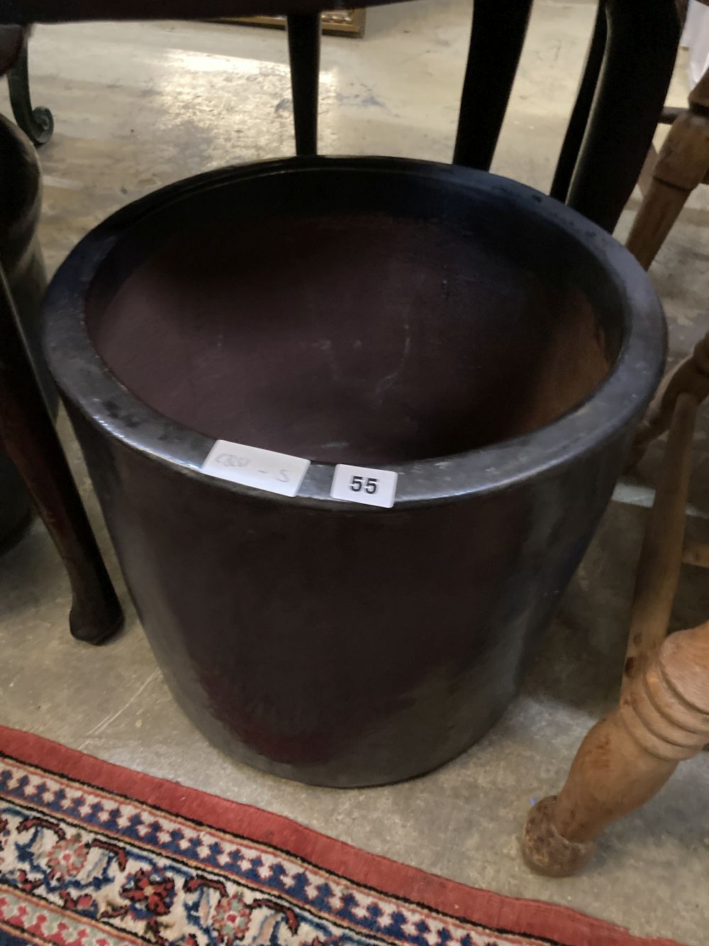 A circular glazed garden planter, height 38cm